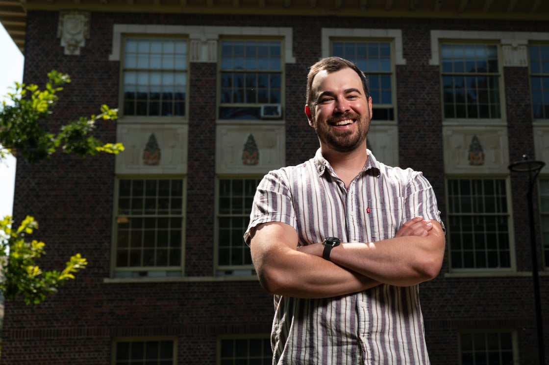 Zach Hoylman standing in front of the Forestry building.
