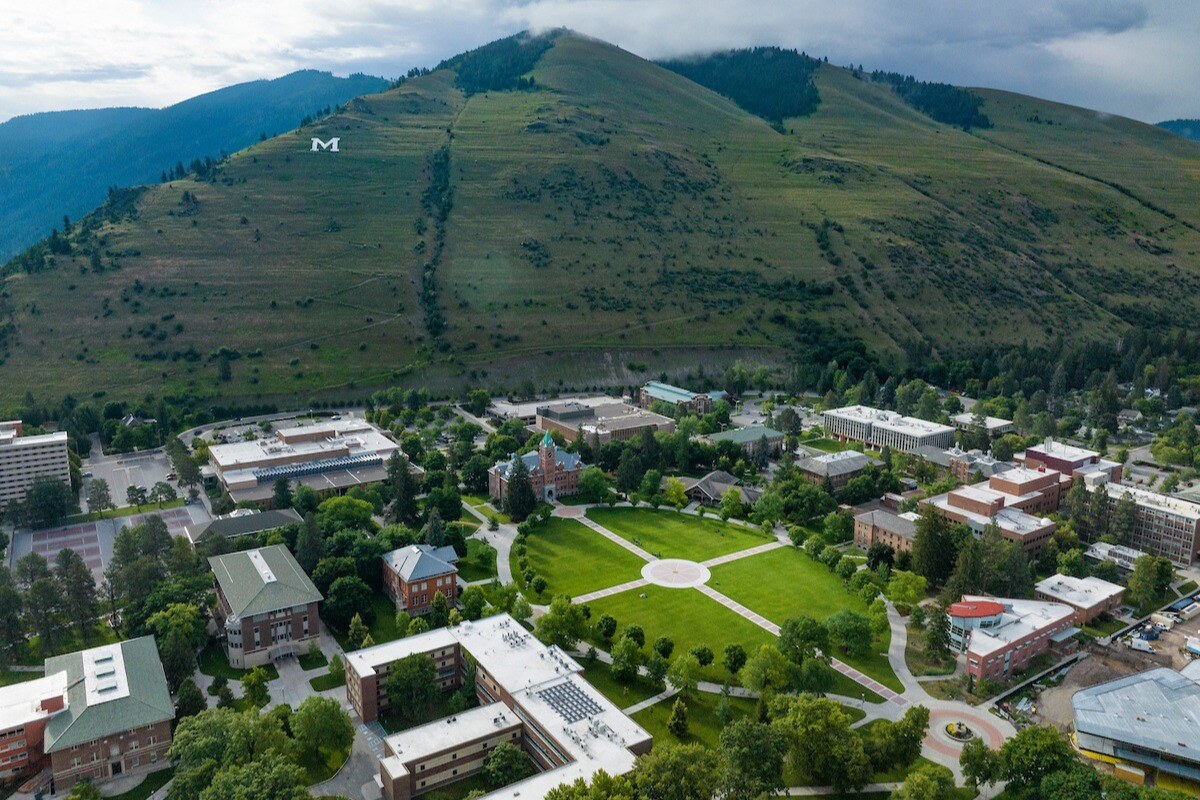 Aerial view of the University of Montana campus in Missoula, MT with Mount Sentinel in the background.