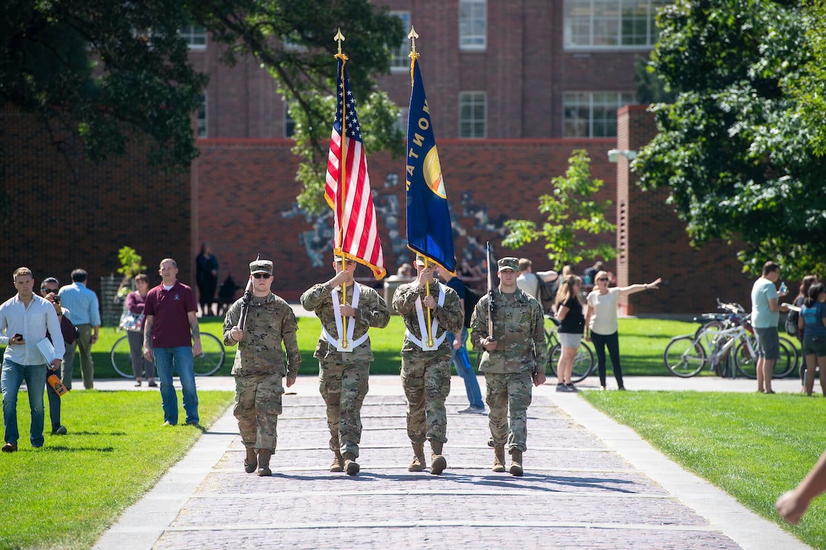 The color guard carries the American and Montanan flags during Welcomefeast on The Oval on the University of Montana campus.